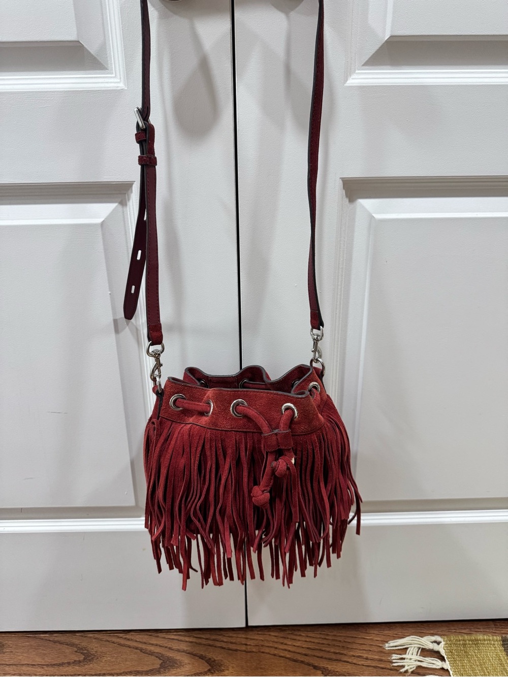 Rebecca Minkoff red suede fringe bucket bag with adjustable strap